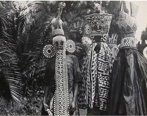 Bameleke costumed ritual dancers, Cameroon, circa 1930's. Photographer unknown.